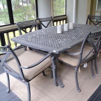Cast Aluminum patio table with 8 matching chairs
