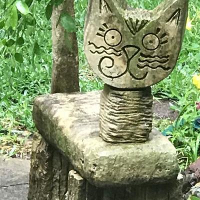 Hand carved stone cat bench by Sandi Stein 