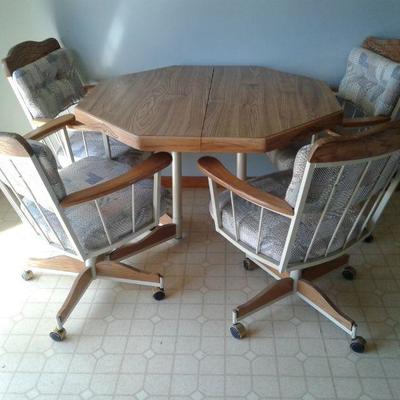 Kitchen Table with Four Captains Chairs