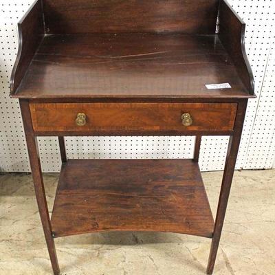  ANTIQUE One Drawer SOLID Mahogany Washstand

Auction Estimate $400-$800 â€“ Located Inside 