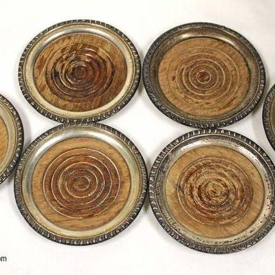  Set of Wood Sterling Wrapped Coasters

Located Showcases â€“ Auction Estimate $20-$50 
