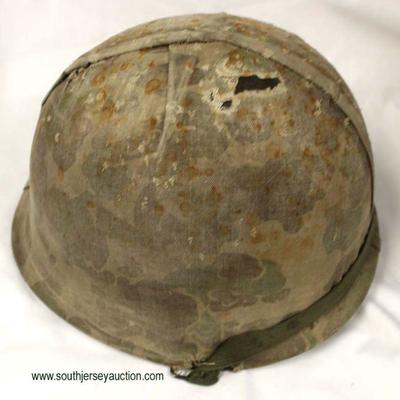  WWII m-1 Front Seam First Model Cover Helmet

Auction Estimate $300-$600 â€“ Located Inside 