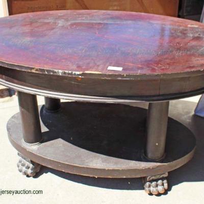  ANTIQUE Mahogany Oval Library Table with Paw Feet

and under top button open pair of drawers

Auction Estimate $200-$400 â€“ Located Dock 