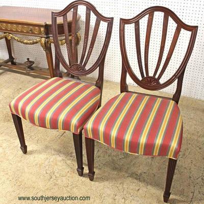  PAIR of SOLID â€œBaker Furniture Historical Collectionâ€ Mahogany Shield Back Chairs

Auction Estimate $100-$300â€“ Located Inside 