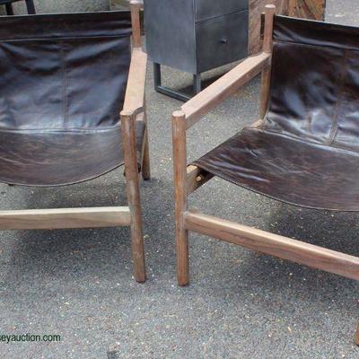  PAIR of Modern Style Wood Frame Chairs

Auction Estimate $200-$400 â€“ Located Inside

Little Pledge will make thest babies Shine !! 