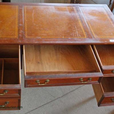  â€œSligh Furnitureâ€ Mahogany Leather Top Desk

Auction Estimate $100-$200 â€“ Located Dock 
