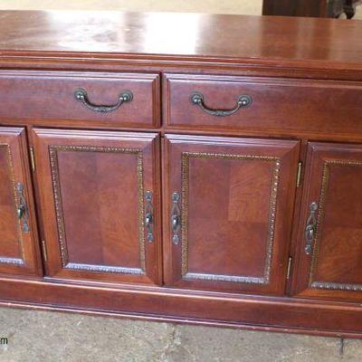  â€” One of Several â€”

Mahogany 4 Door 2 Drawer Sideboards

Auction Estimate $100-$300 â€“ Located Inside 