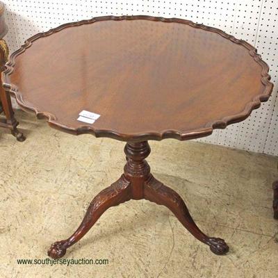  BEAUTIFUL â€œBaker Furniture Historical Collectionâ€ Burl Mahogany Ball and Claw Pie Crust Tilt Top Table

Auction Estimate $200-$400...