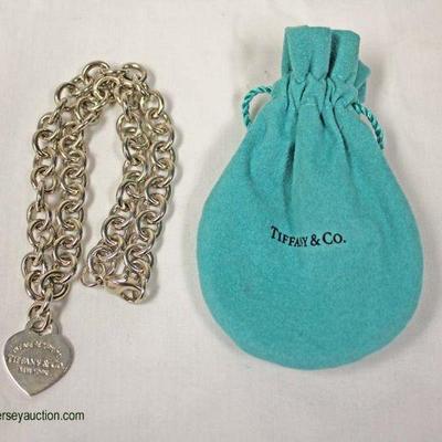 Sterling Silver â€œTiffany and Companyâ€ Heart Charm Necklace
Auction Estimate $200-$500 â€“ Located Inside
