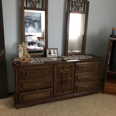 4-piece bedroom set includes queen size headboard (next picture), long dresser with 2 mirrors, and not pictured, tall dresser and nightstand