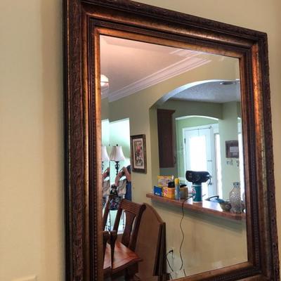 Large mirror with wood/gold frame. 