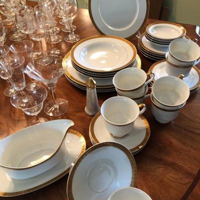 Gold rimmed china.