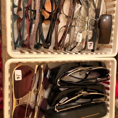 Many reading glasses.