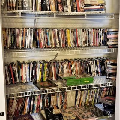 Hundreds of DVD movies - many still in shrink wrap