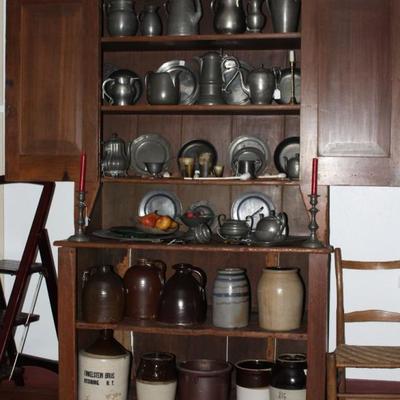 Antique Primitive Americana Large Step-back Cupboard finales with a large Collection of Antique Pewter and Salt Glazed Stoneware Crocks ....