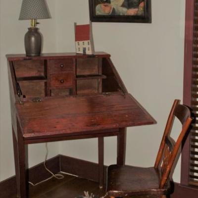 Interior View: Antique Slant Top  Scribeâ€™s/School Master Desk.  Top is hinged to tilt forward to create an open desk revealing cubbies....