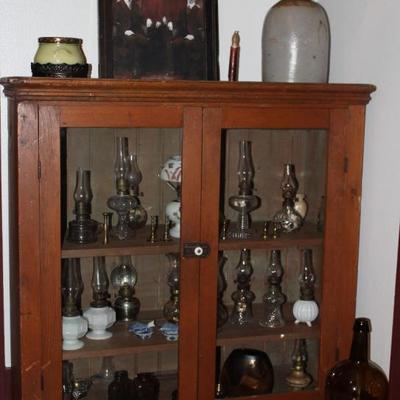 Antique Pine  Cabinet Top - Double Door Glass Front Jelly Cabinet (37â€ H x 36â€W x 13â€D).   A display of Miniature Oil Lamps can be...
