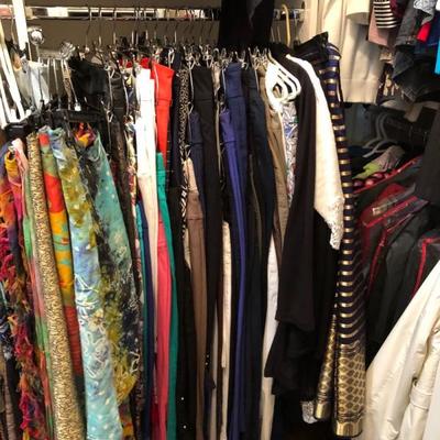 A large closet full of quality women's clothing.