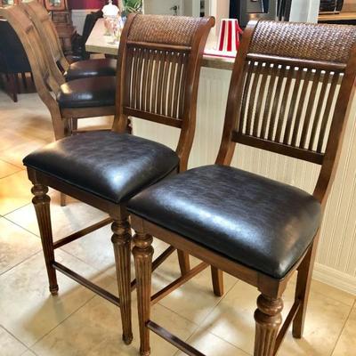 4 Highback Bar Stools with leather-like upholstery