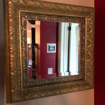 Pair of matching, small, gold-framed mirrors.