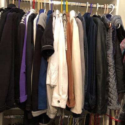 A large closet full of quality women's clothing.