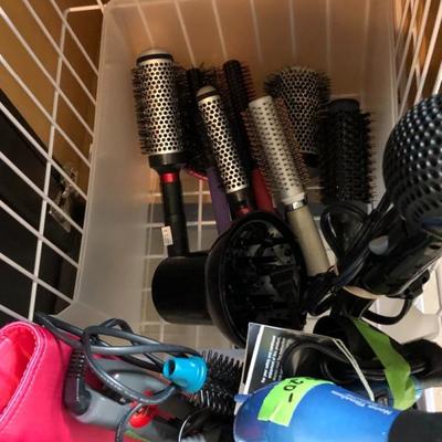 Hair straighteners, curling irons, dryers, brushes.