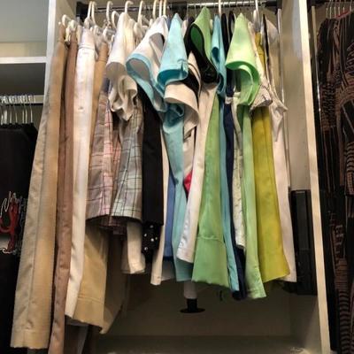 A large closet full of quality women's clothing.