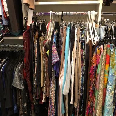 A large closet full of quality women's clothing.