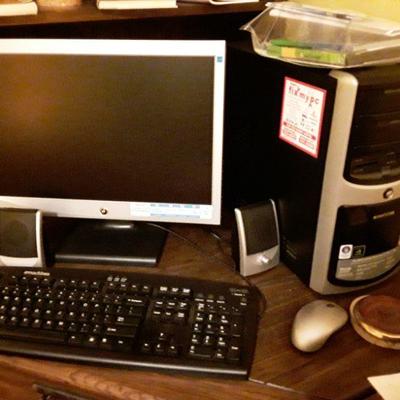 Emachines computer with paperwork. Great for students or home office.