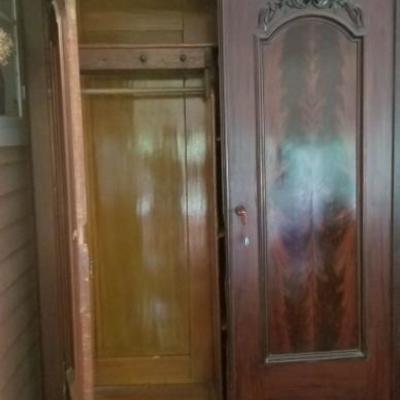 10 foot mahogany carved armoire