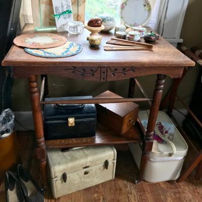 Oak carved table on casters $125
26 X 20 X 29"