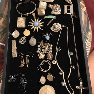 Sterling jewelry
pinecone set, dog pin and bug pin SOLD