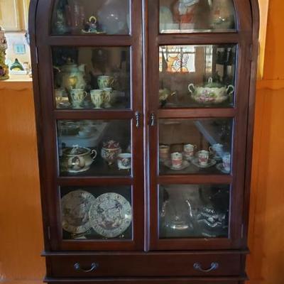 antique round top china cabinet