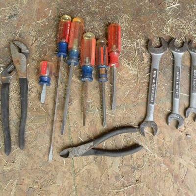 Assorted tools - wrenches, pliers and screwdrivers