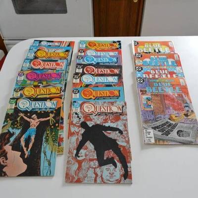 14 The Question comics and 4 Blue Beetle comics