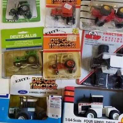 1 lot  ERTL 8 each Tractors  1 64 scale  See P ...