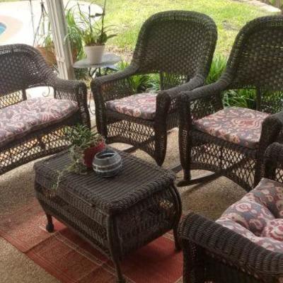 Outdoor wicker set. 
One chair, two rocking chairs, 1 bench, plus coffee table.