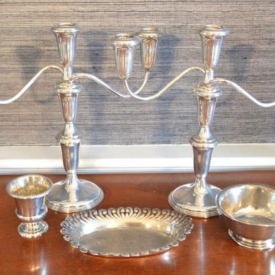 Sterling silver candelabras and dishes