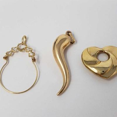 #195: Three 14k Gold Pendents, 5g
Combined weigh approx 5g 