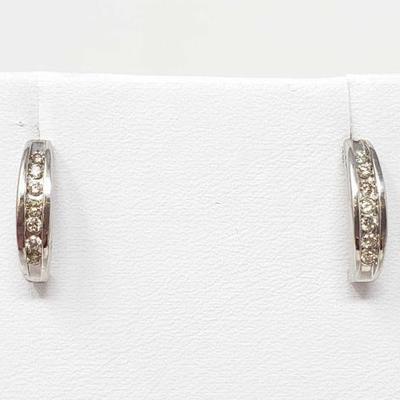#23: Pair of 14k White Gold Diamond Earrings, 2.1g
Weight approx 2.1g