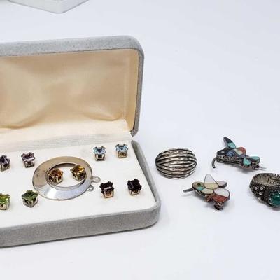 #193: Sterling Silver Ring, Pins and Five Pairs of Earrings
All combined weigh approx 22g, rings is size 5.5 