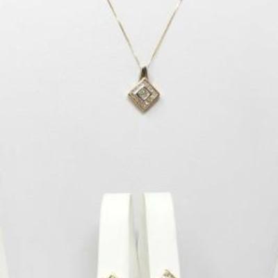 #65: Matching 14k Gold Diamond Earrings and Necklace, 7.3g
Necklace and earring Combined weigh approx 7.3g, necklace measures approx 18