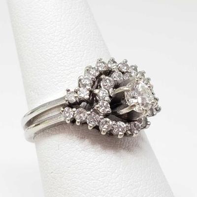 #209: 14k White Gold Diamond Ring with Diamond Band, 4.6g
Weigh approx 4.6g, center diamond is 1/4 ct, size 6.5