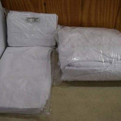 2 Fitted Twin Sheets and 18 Standard Pillowcases