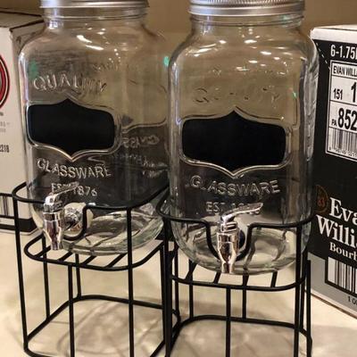 Beverage dispensers on metal stand