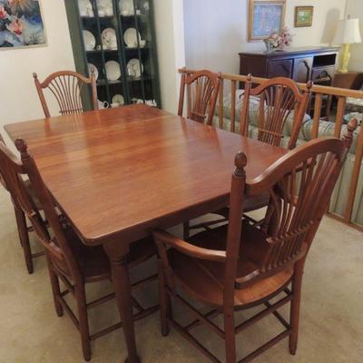 Seely dining table with six chairs and leaves
