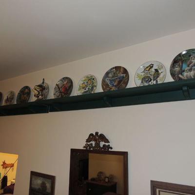 Wooden shelves and plate collection