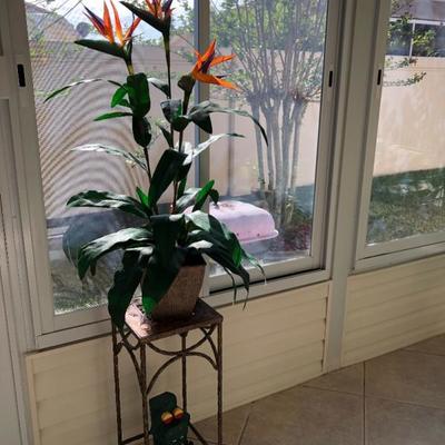 Tropical faux flower arrangement/metal plant stand