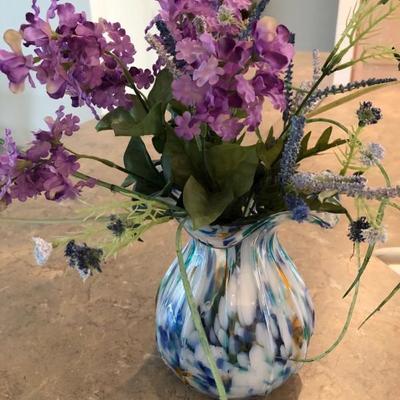 Art glass vase with faux flowers