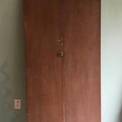 Bi-fold wood composite door